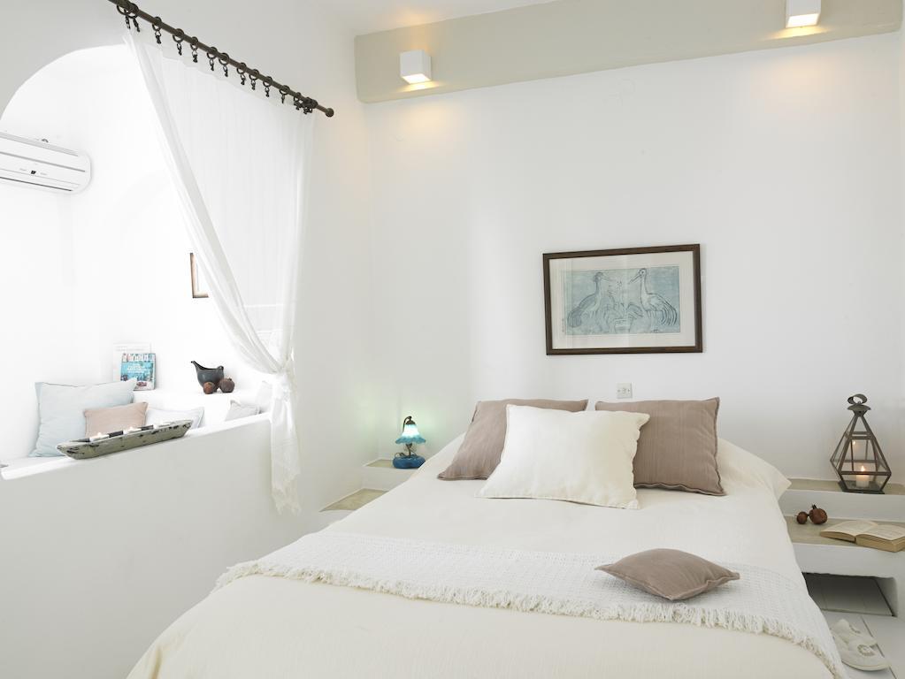 Altana Heritage Suites Imerovigli  Rum bild